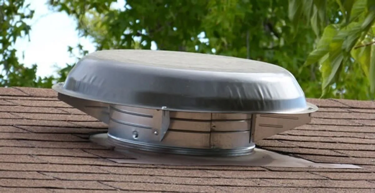 attic fan installation services with low-profile roof ventilation unit in Louisville, KY