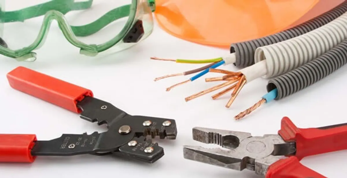 Electrical wiring repair with professional tools and safety equipment in Jeffersonville, IN