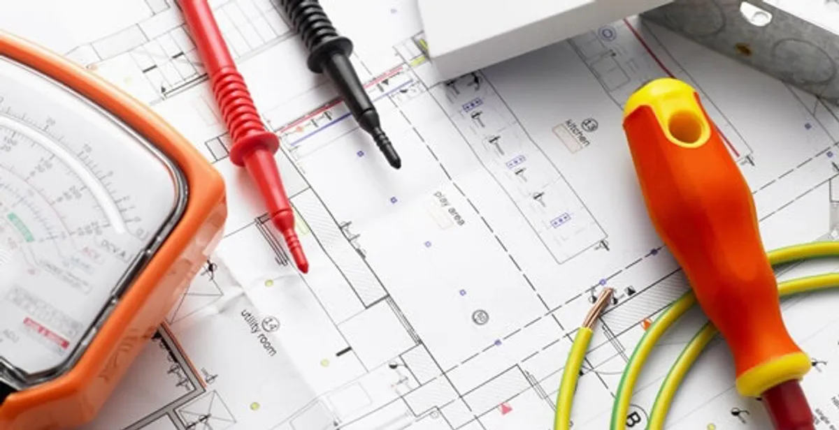 licensed electrician planning and testing electrical systems using professional tools in Louisville, KY