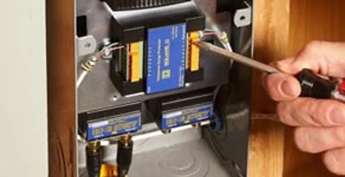 Whole home surge protection device being installed by a licensed electrician to protect electrical systems in Louisville, KY